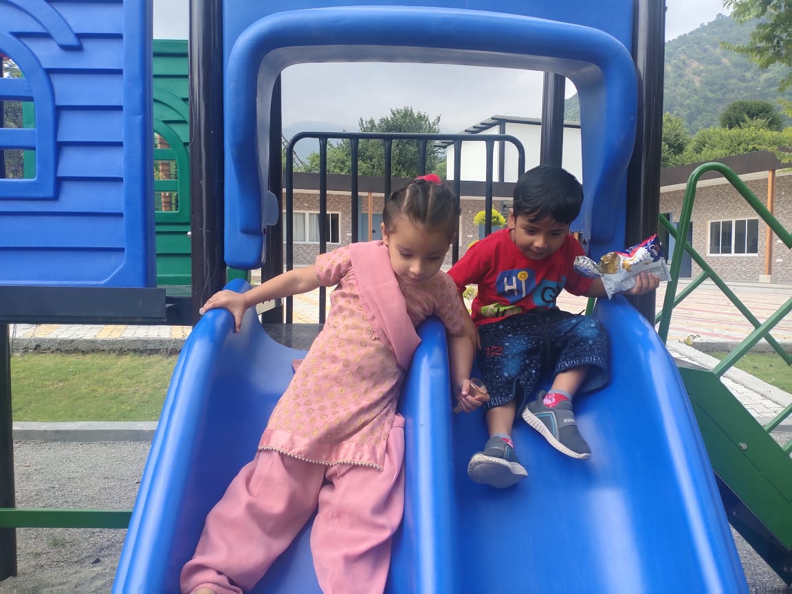 Parent spending quality time with their child, playing a game together.